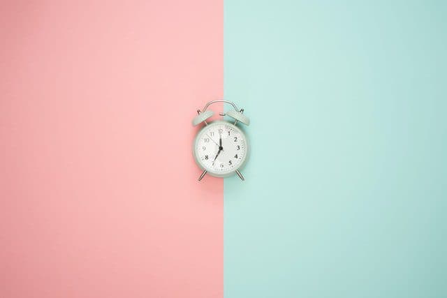 Photo by Clock - writing exercises - Icons8 Team on Unsplash