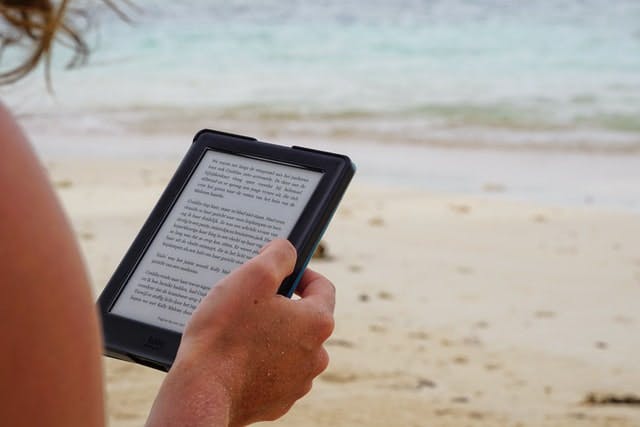 Kindle on the Beach - Photo by Maarten van den Heuvel on Unsplash