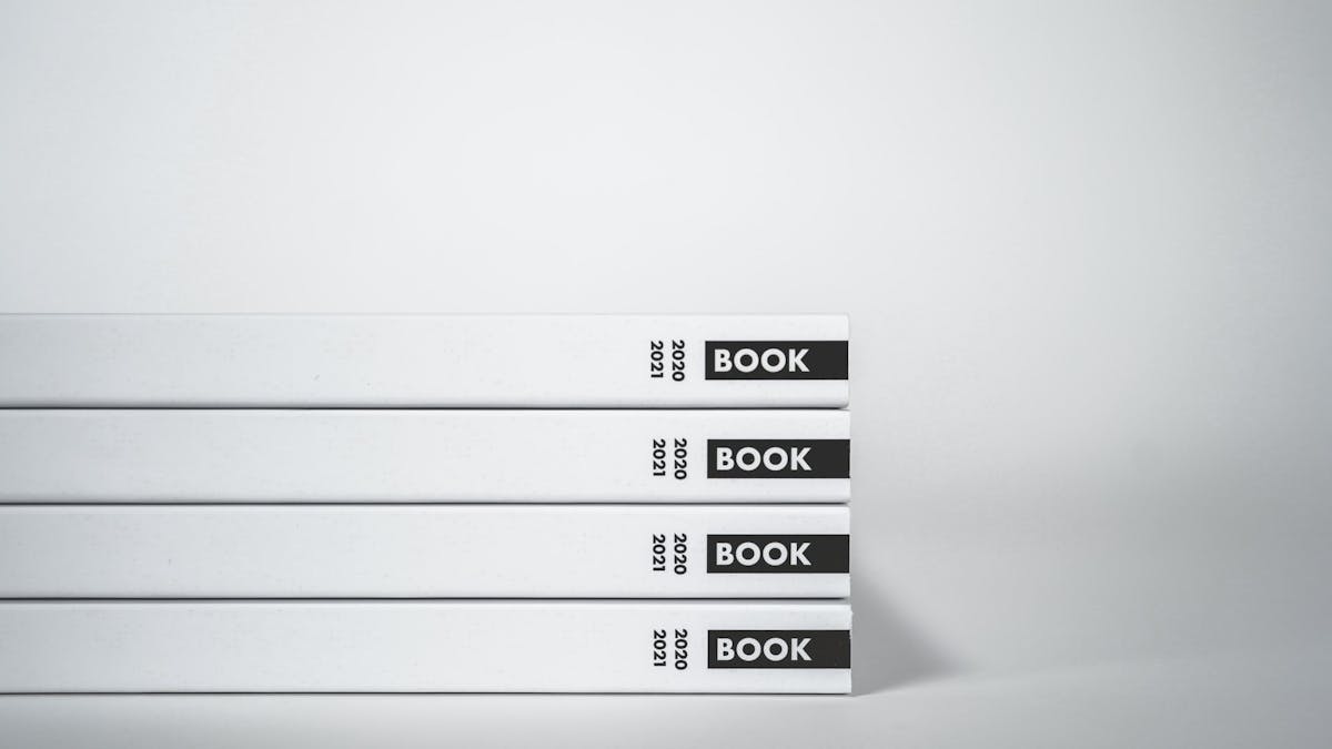 book spines waiting for ISBN - Photo by Quentin Durand on Unsplash