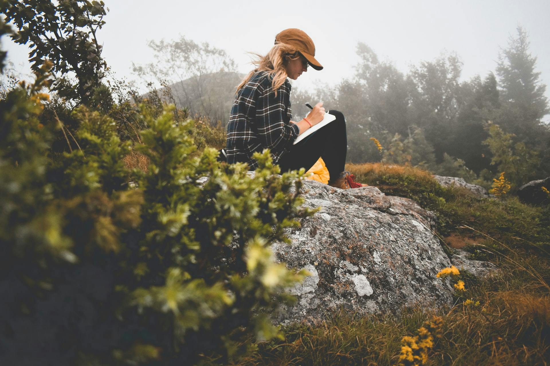 a writer showing humility in nature - Photo by Ashlyn Ciara on Unsplash